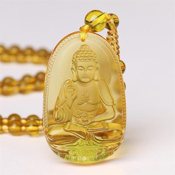 Pendentif Bouddha ambre jaune